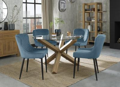 Product photograph of Bentley Designs Turin Glass 4 Seater Dining Table Light Oak Legs With 4 Cezanne Petrol Blue Velvet Chairs - Black Legs from Choice Furniture Superstore