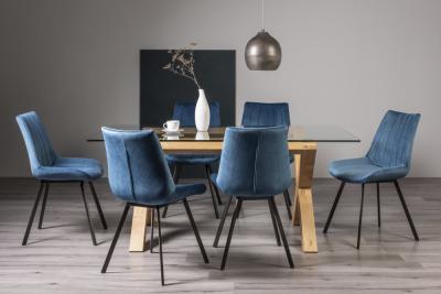 Product photograph of Bentley Designs Turin Glass 6 Seater Dining Table Light Oak Legs With 6 Fontana Blue Velvet Chairs from Choice Furniture Superstore