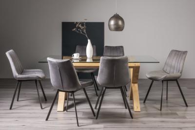 Product photograph of Bentley Designs Turin Glass 6 Seater Dining Table Light Oak Legs With 6 Fontana Grey Velvet Chairs from Choice Furniture Superstore