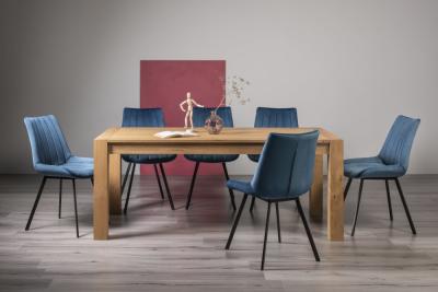 Bentley Designs Turin Light Oak 610 Seater Extending Dining Table With 8 Fontana Blue Velvet Chairs