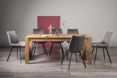 Bentley Designs Turin Light Oak 610 Seater Extending Dining Table With 8 Fontana Grey Velvet Chairs