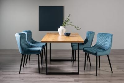 Product photograph of Bentley Designs Ramsay Oak Melamine 6 Seater Dining Table - U Leg With 4 Cezanne Petrol Blue Velvet Chairs - Black Legs from Choice Furniture Superstore