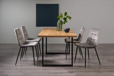 Product photograph of Bentley Designs Ramsay Oak Melamine 6 Seater Dining Table - U Leg With 4 Mondrian Grey Velvet Chairs from Choice Furniture Superstore