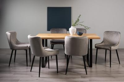 Product photograph of Bentley Designs Ramsay Oak Melamine 6 Seater Dining Table - U Leg With 6 Cezanne Grey Velvet Chairs - Black Legs from Choice Furniture Superstore