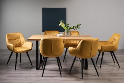 Product photograph of Bentley Designs Ramsay Oak Melamine 6 Seater Dining Table - U Leg With 6 Dali Mustard Velvet Chairs from Choice Furniture Superstore