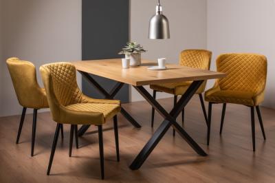 Product photograph of Bentley Designs Ramsay Oak Melamine 6 Seater Dining Table - X Leg With 4 Cezanne Mustard Velvet Chairs - Black Legs from Choice Furniture Superstore