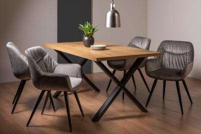 Product photograph of Bentley Designs Ramsay Oak Melamine 6 Seater Dining Table - X Leg With 4 Dali Grey Velvet Chairs from Choice Furniture Superstore