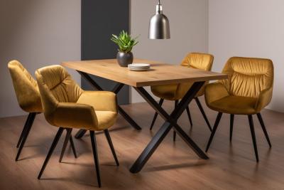 Product photograph of Bentley Designs Ramsay Oak Melamine 6 Seater Dining Table - X Leg With 4 Dali Mustard Velvet Chairs from Choice Furniture Superstore