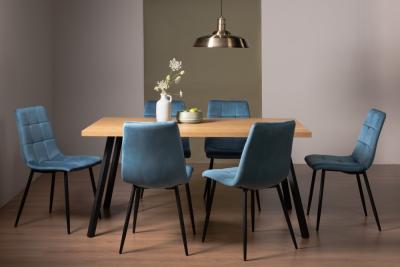 Product photograph of Bentley Designs Ramsay Oak Melamine 6 Seater Dining Table With 6 Mondrian Petrol Blue Velvet Chairs from Choice Furniture Superstore