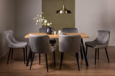 Product photograph of Bentley Designs Ramsay Oak Melamine 6 Seater Dining Table With 6 Cezanne Grey Velvet Chairs - Black Legs from Choice Furniture Superstore