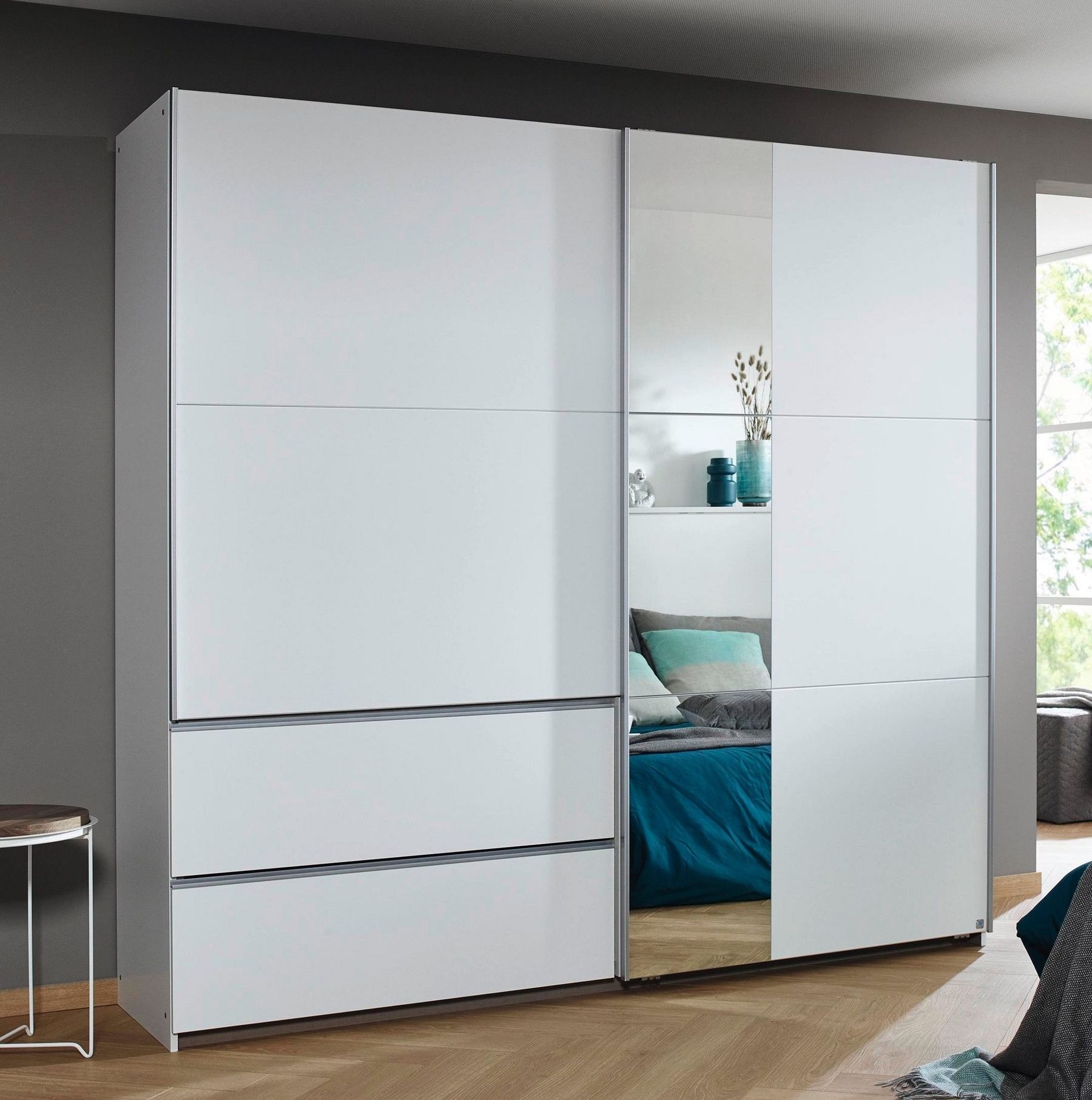 Rauch Sevilla Alpine White 2 Door 2 Drawer Combi Sliding Wardrobe With Aluminium Handle Strips And Mirror Panel 218cm