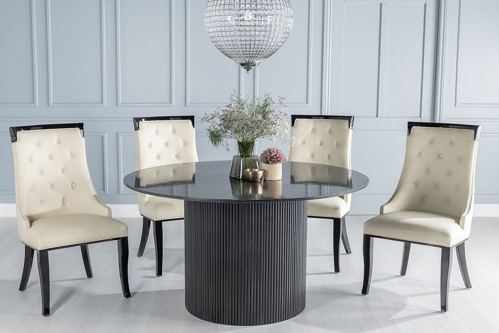 Carra Marble Dining Table Black Round Top And Fluted Ribbed Drum Base With Carmela Cream Faux Leather Chairs