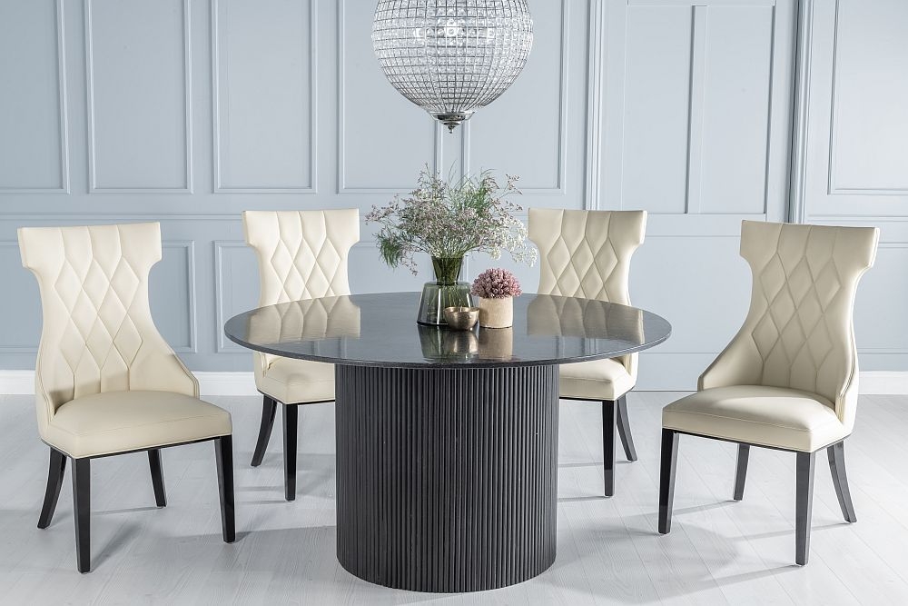 Carra Marble Dining Table Black Round Top And Fluted Ribbed Drum Base With Mimi Cream Faux Leather Chairs