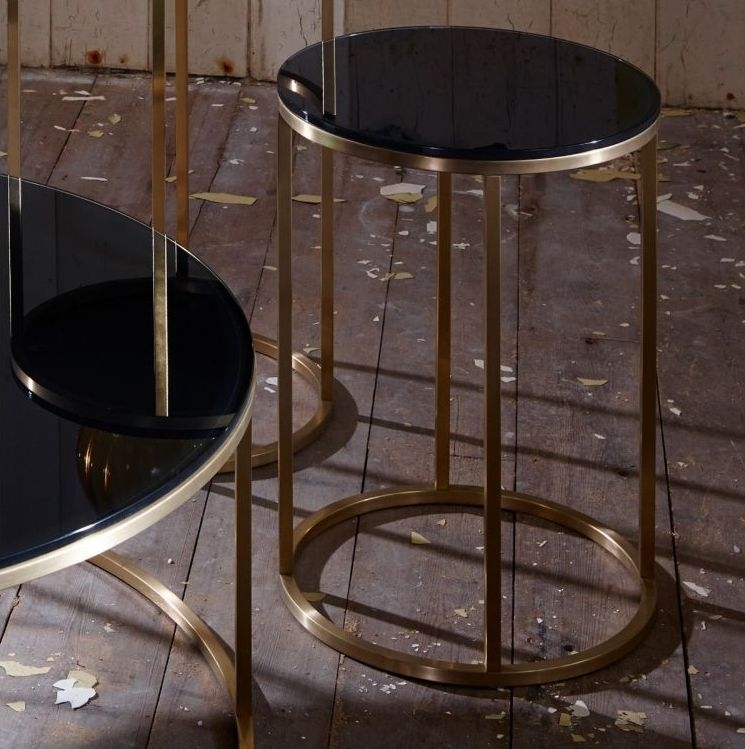 Product photograph of Kensal Black Glass And Brass Frame Round Side Table from Choice Furniture Superstore.