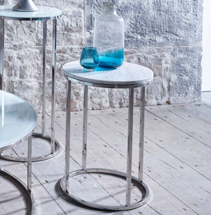 Product photograph of Gillmore Space Kensal White Glass And Stainless Steel Round Side Table from Choice Furniture Superstore.