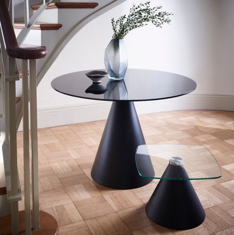 Product photograph of Gillmore Space Oscar Black Glass 80cm Round Small Dining Table With Black Conical Base - 2 Seater from Choice Furniture Superstore.