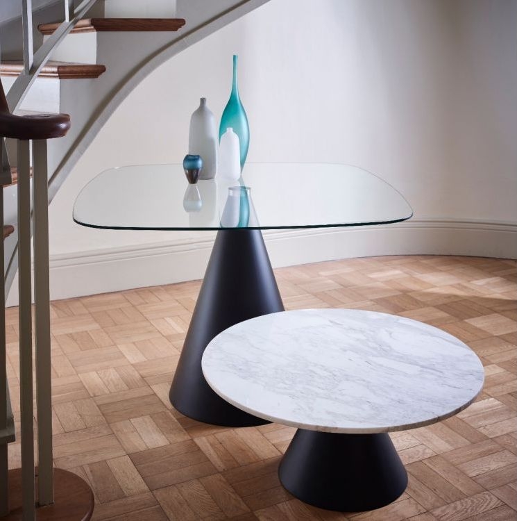 Product photograph of Oscar Clear Glass 4 Seater Round Dining Table With Black Cone Base from Choice Furniture Superstore.