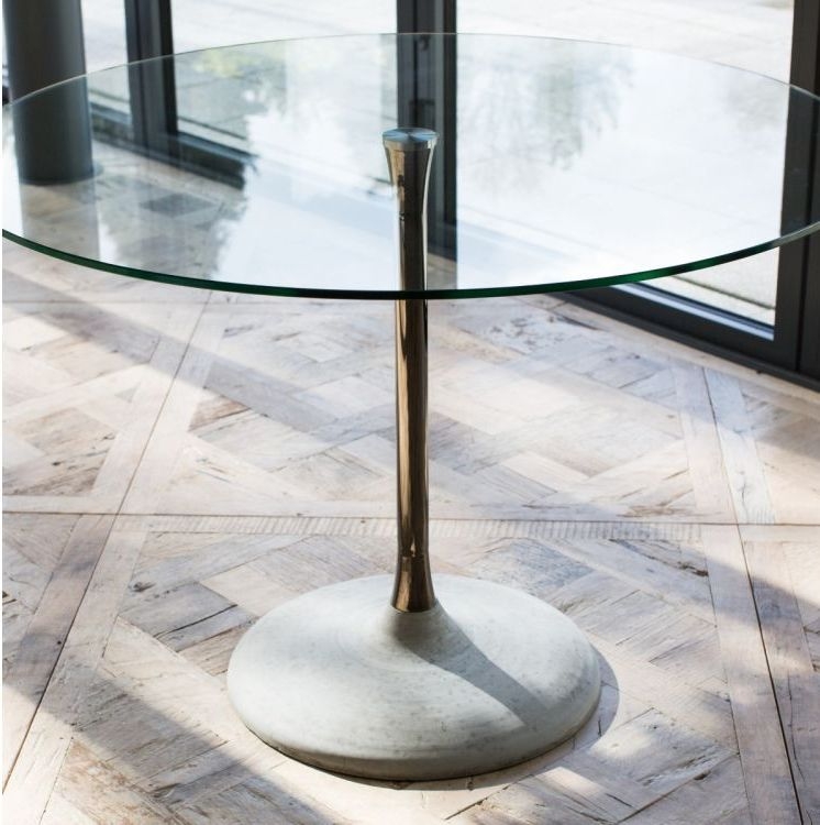 Product photograph of Gillmore Space Swan Clear Glass Top And Dark Chrome Column 80cm Round Dining Table With Concrete Base from Choice Furniture Superstore.