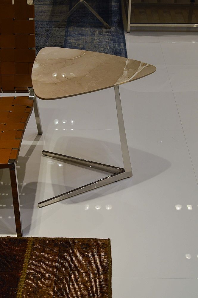 Product photograph of Stone International Plectrum Triangular Accent Table - Marble And Polished Steel from Choice Furniture Superstore.