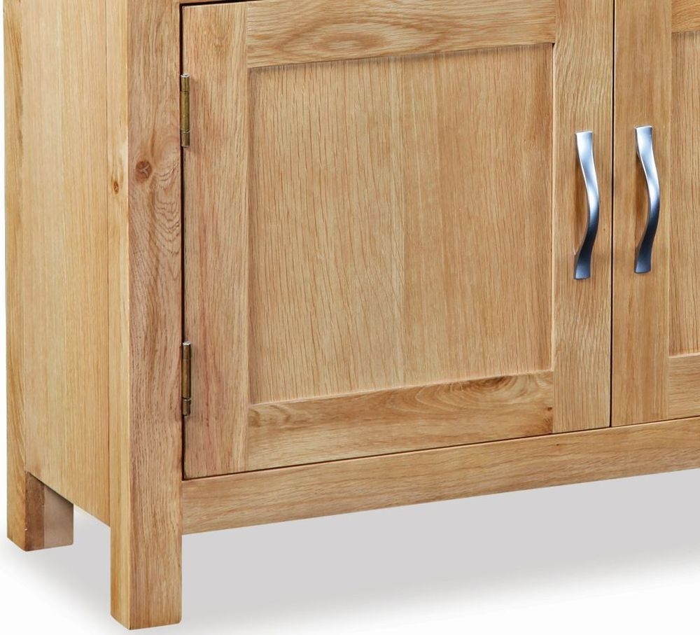 Product photograph of New Trinity Natural Oak Small Sideboard With 2 Doors And 2 Drawers from Choice Furniture Superstore.