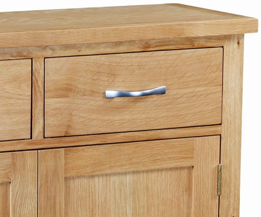 Product photograph of New Trinity Natural Oak Small Sideboard With 2 Doors And 2 Drawers from Choice Furniture Superstore.