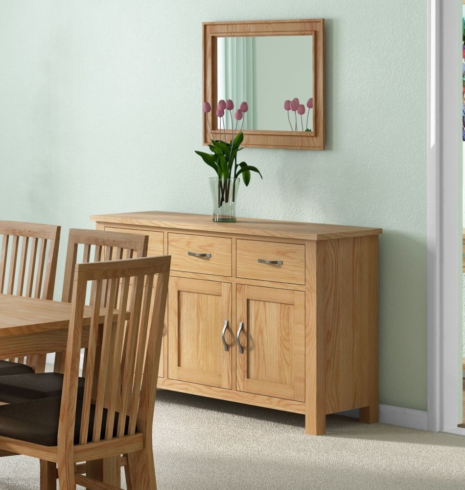 Product photograph of Cameron Natural Oak 130cm Medium 3 Door Sideboard from Choice Furniture Superstore.