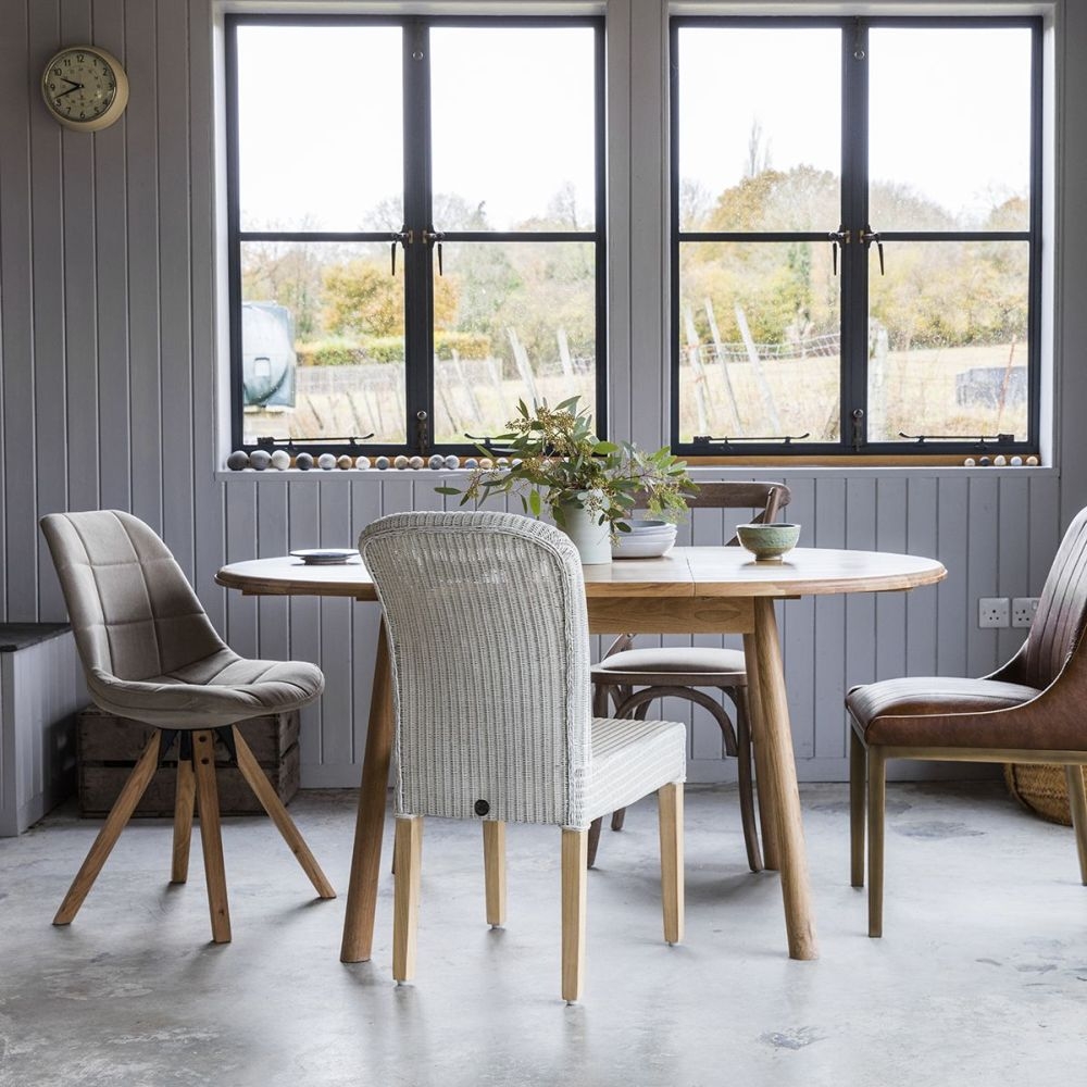 Product photograph of Wycombe Oak Round 2 Seater Extending Dining Table from Choice Furniture Superstore.