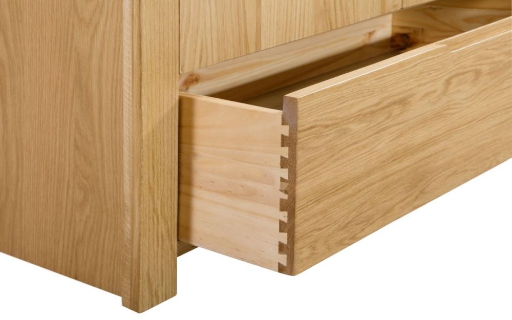 Product photograph of Curve Oak 6 Drawer Wide Chest from Choice Furniture Superstore.