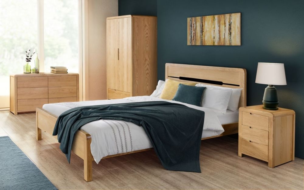 Product photograph of Curve Oak 6 Drawer Wide Chest from Choice Furniture Superstore.