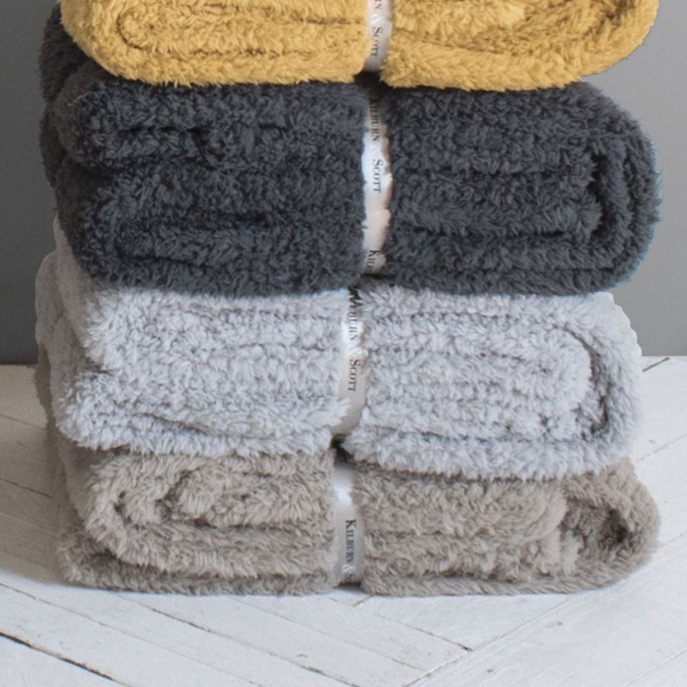 Product photograph of Teddy Snuggly Silver Fleece Fabric Throw from Choice Furniture Superstore.