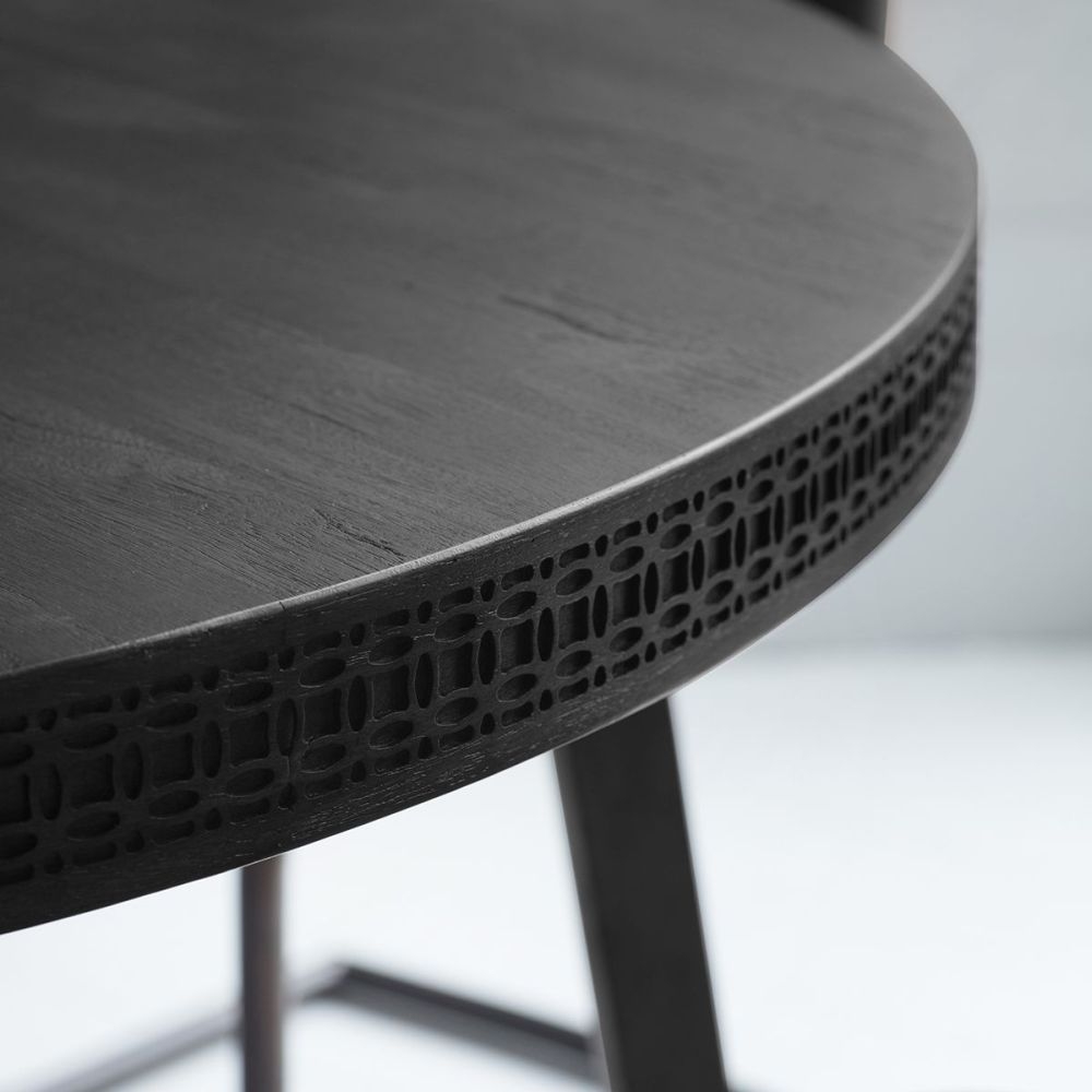 Product photograph of Boho Boutique Black Mango Wood Round Dining Table - 4 Seater from Choice Furniture Superstore.