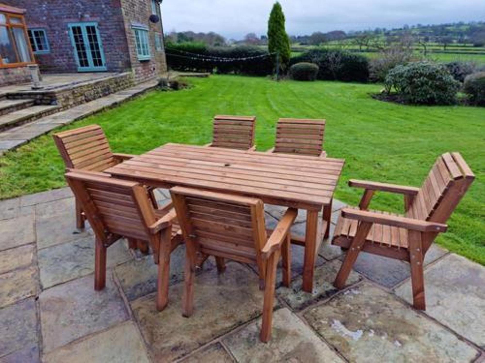 Product photograph of Churnet Valley Brown Outdoor Rectangular Table Set With 6 Chairs from Choice Furniture Superstore.