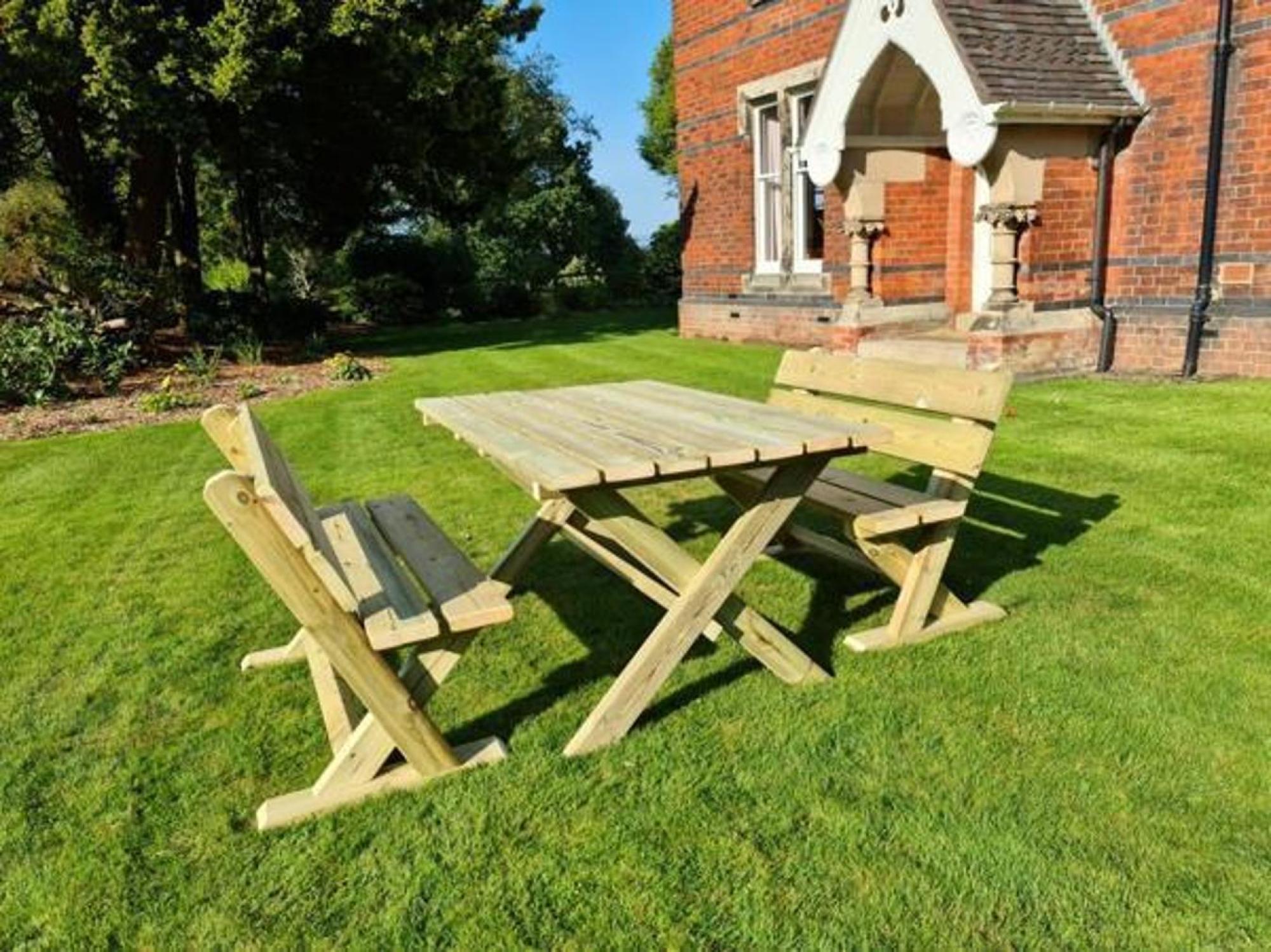 Product photograph of Churnet Valley Ashcombe Rectangular Garden Table Set With 2 Benches from Choice Furniture Superstore.