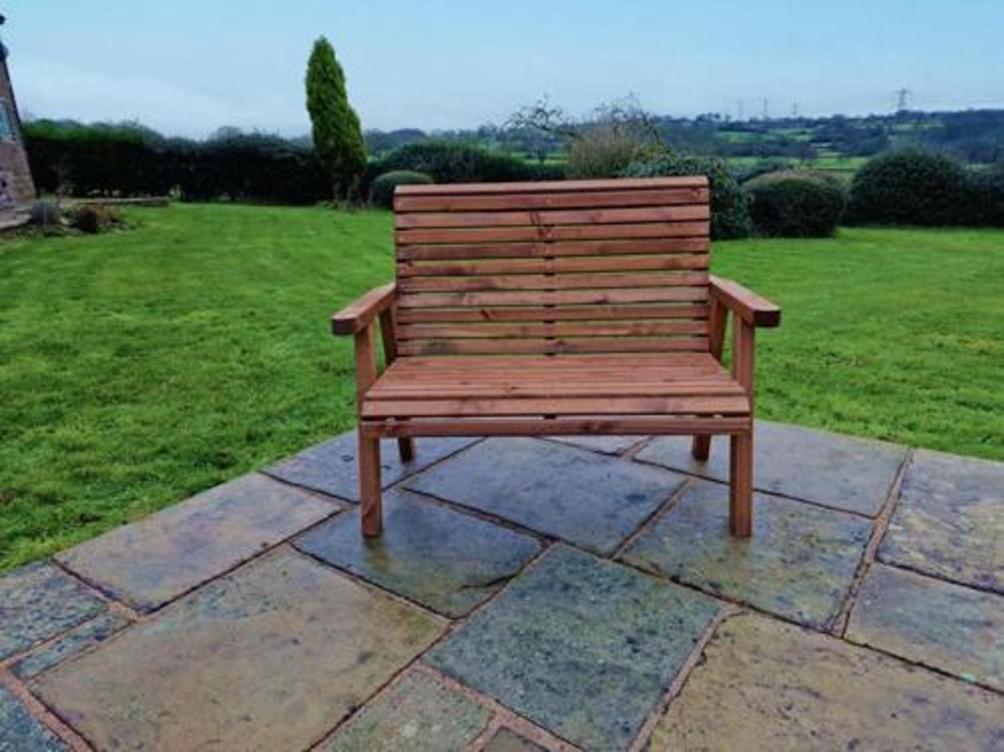 Product photograph of Churnet Valley Brown Outdoor 2 Seater Bench from Choice Furniture Superstore.