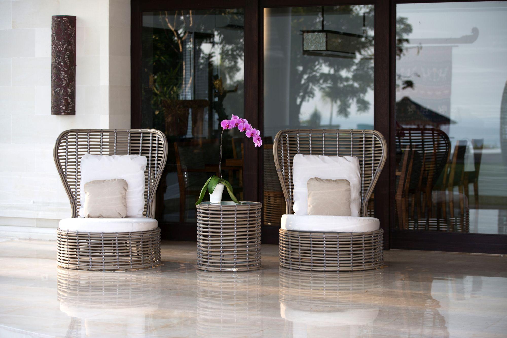 Product photograph of Skyline Bakari Walnut Rattan And Glass Top Outdoor Round Side Table from Choice Furniture Superstore.