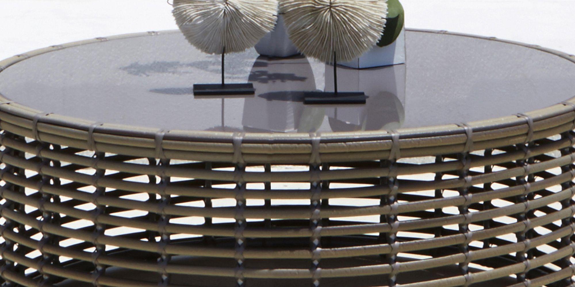 Product photograph of Skyline Bakari Walnut Rattan And Glass Top Outdoor Round Coffee Table from Choice Furniture Superstore.