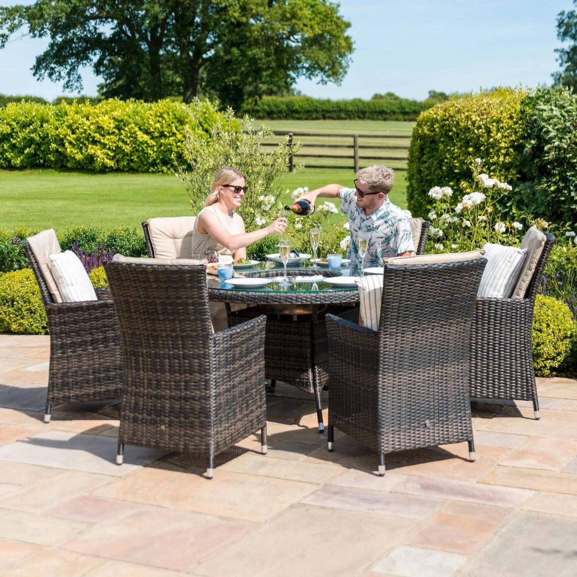 Product photograph of Maze La Rattan Brown 6 Seater Round Ice Bucket Dining Table Set With 6 Chairs from Choice Furniture Superstore.