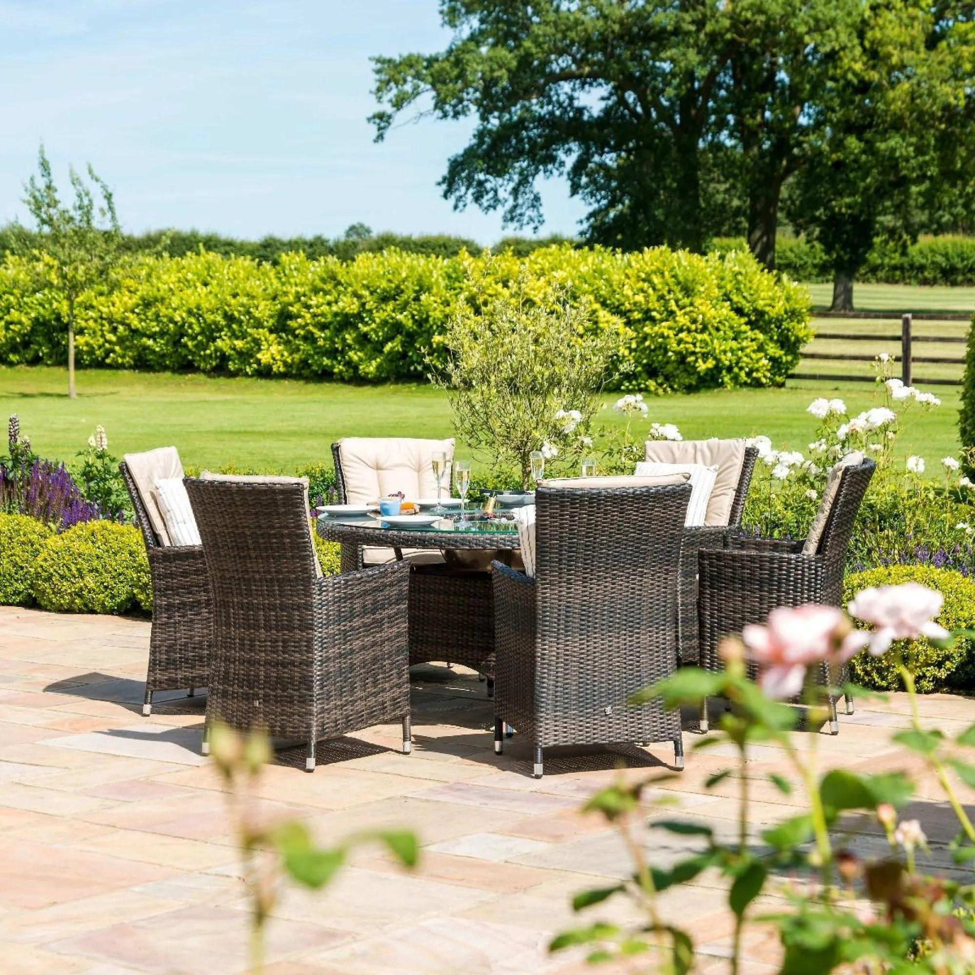 Product photograph of Maze La Rattan Brown 6 Seater Round Ice Bucket Dining Table Set With 6 Chairs from Choice Furniture Superstore.