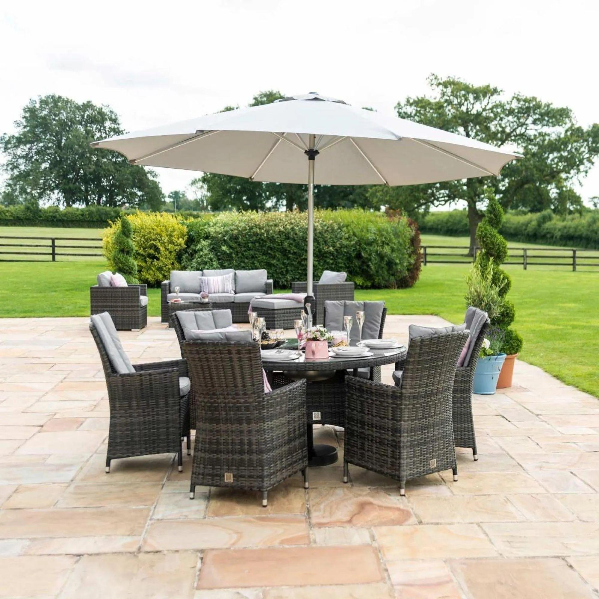 Product photograph of Maze La Rattan Grey 6 Seater Round Ice Bucket Dining Table Set With 6 Chairs from Choice Furniture Superstore.