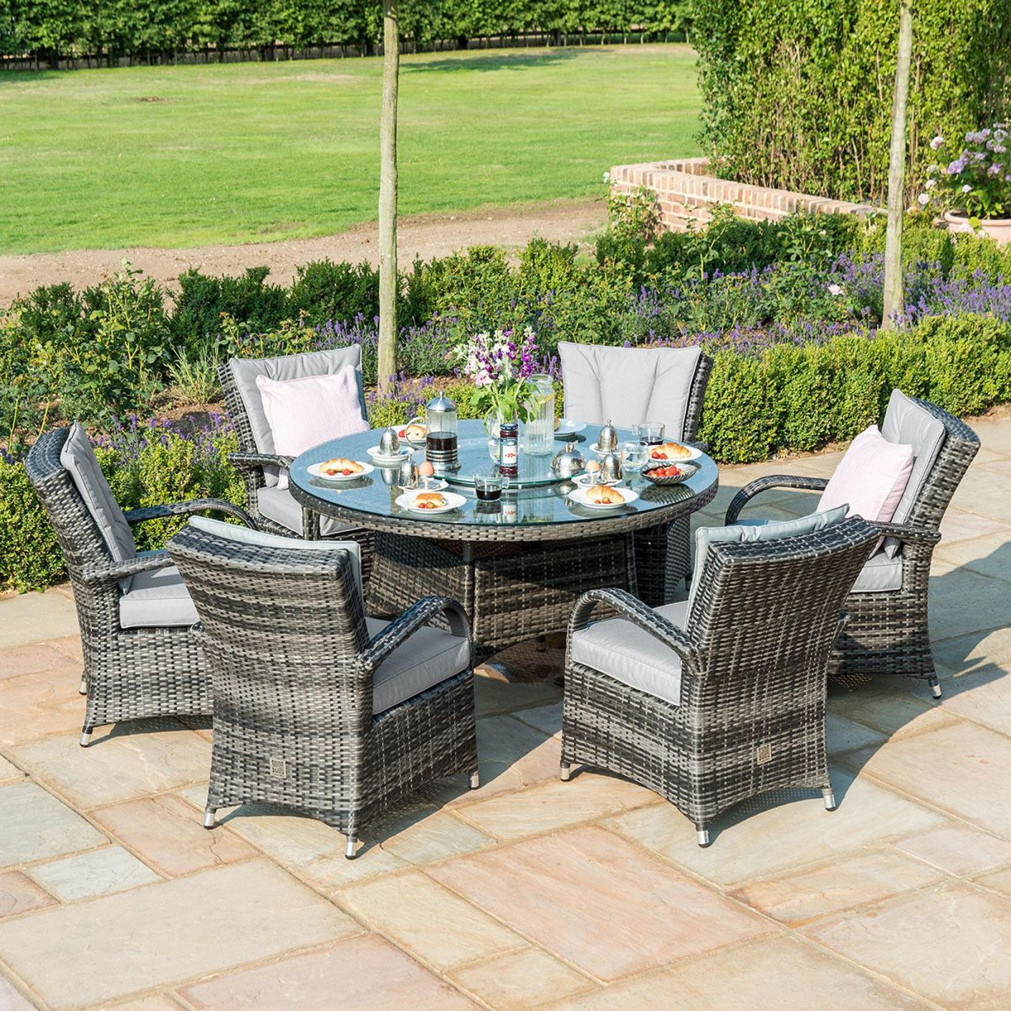 Product photograph of Maze Texas Rattan Grey 2 Seater Round Ice Bucket Dining Table Set With 6 Chiars from Choice Furniture Superstore.