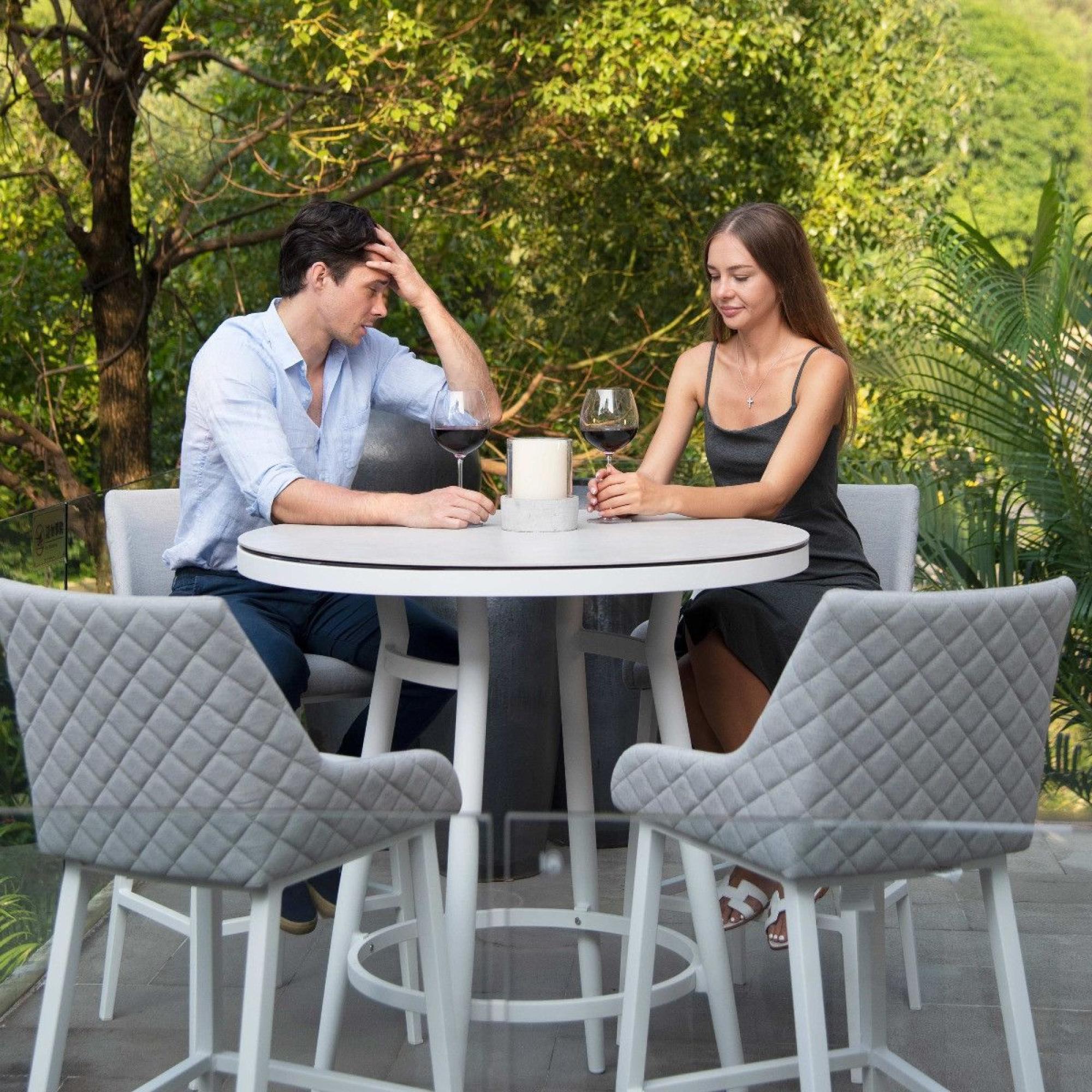 Product photograph of Maze Regal Lead Chine Fabric 4 Seater Round Bar Set With 4 Chairs And Table from Choice Furniture Superstore.