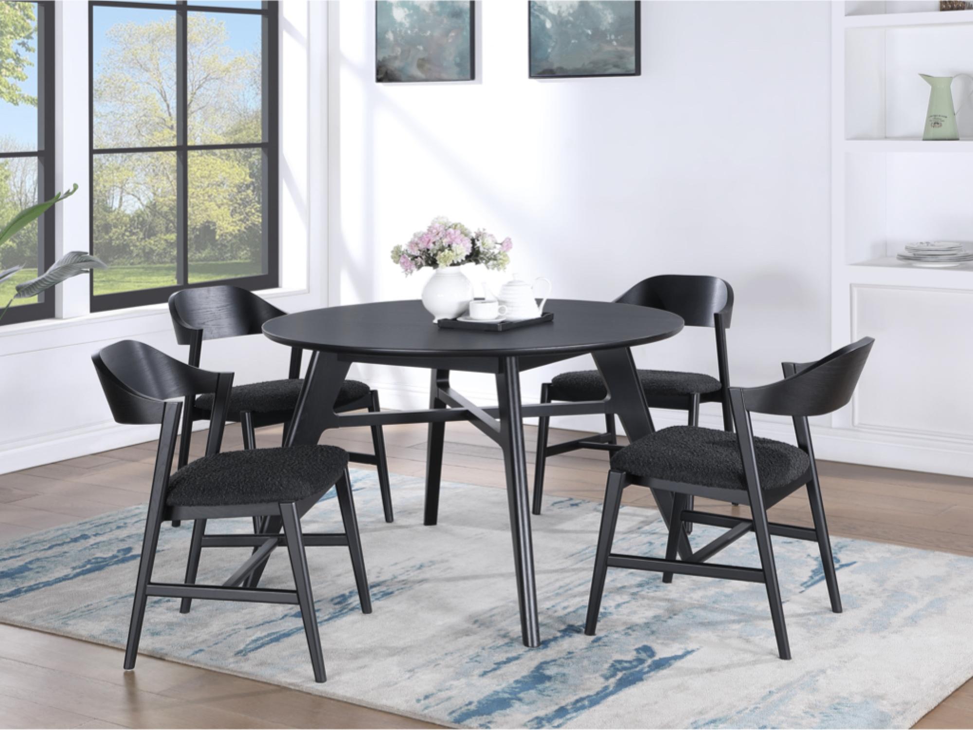 Product photograph of Carrington Black Oak 4 Seater Round Dining Set from Choice Furniture Superstore.