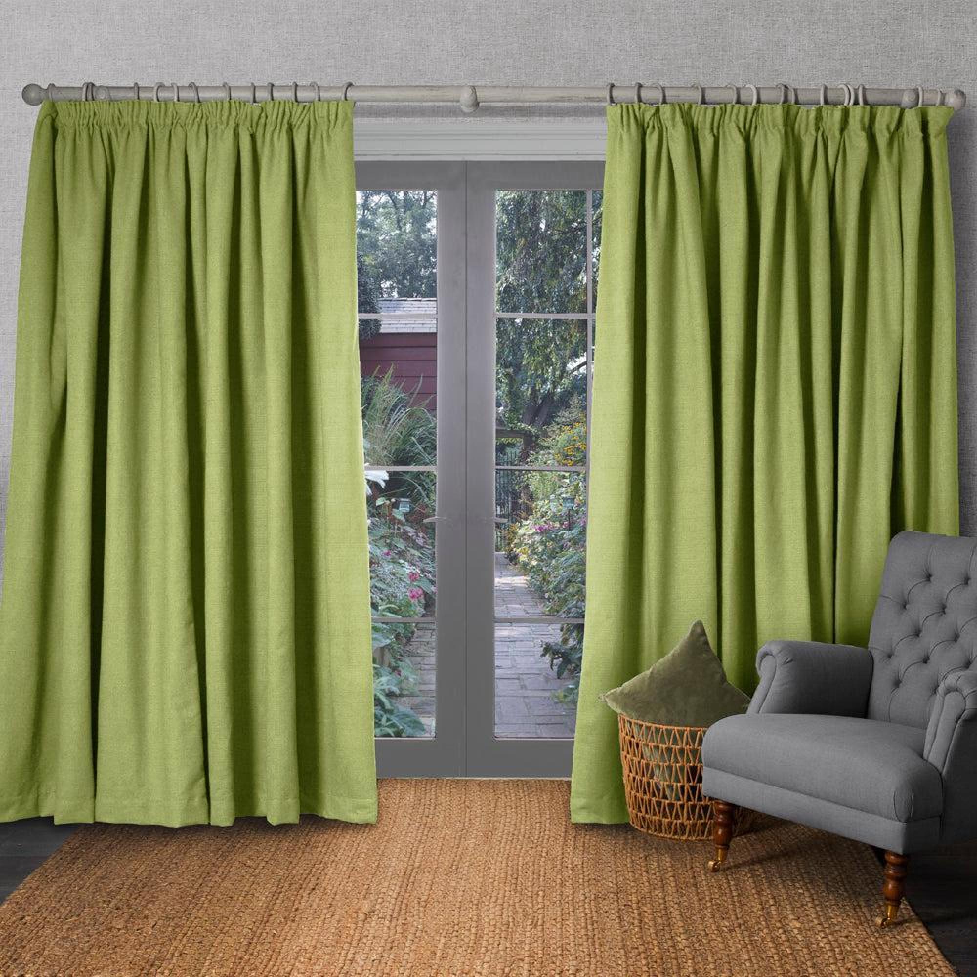 Product photograph of Voyage Maison Malleny Kiwi Woven Pencil Pleat Curtains from Choice Furniture Superstore.