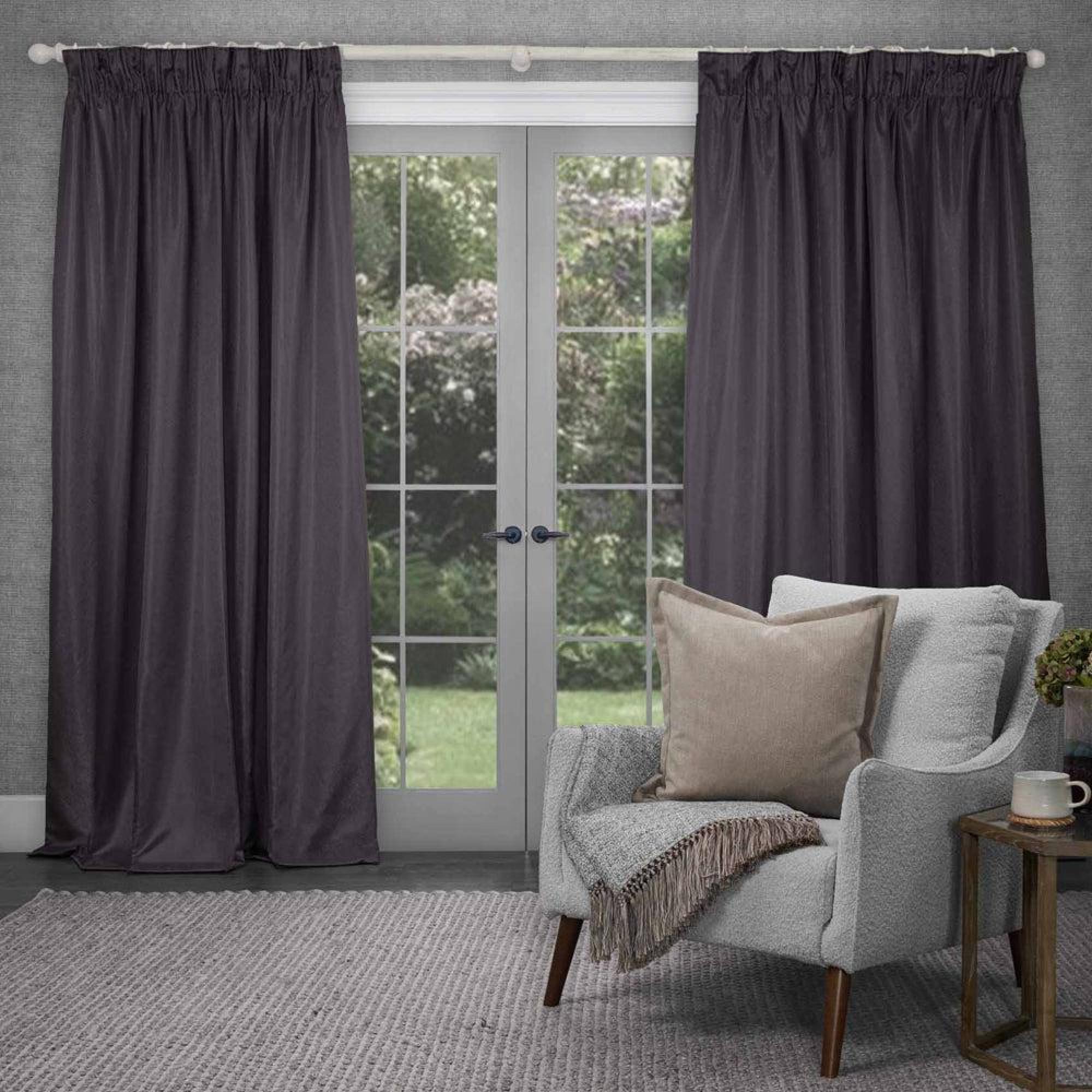 Product photograph of Voyage Maison Sereno Damson Woven Pencil Pleat Curtains from Choice Furniture Superstore.