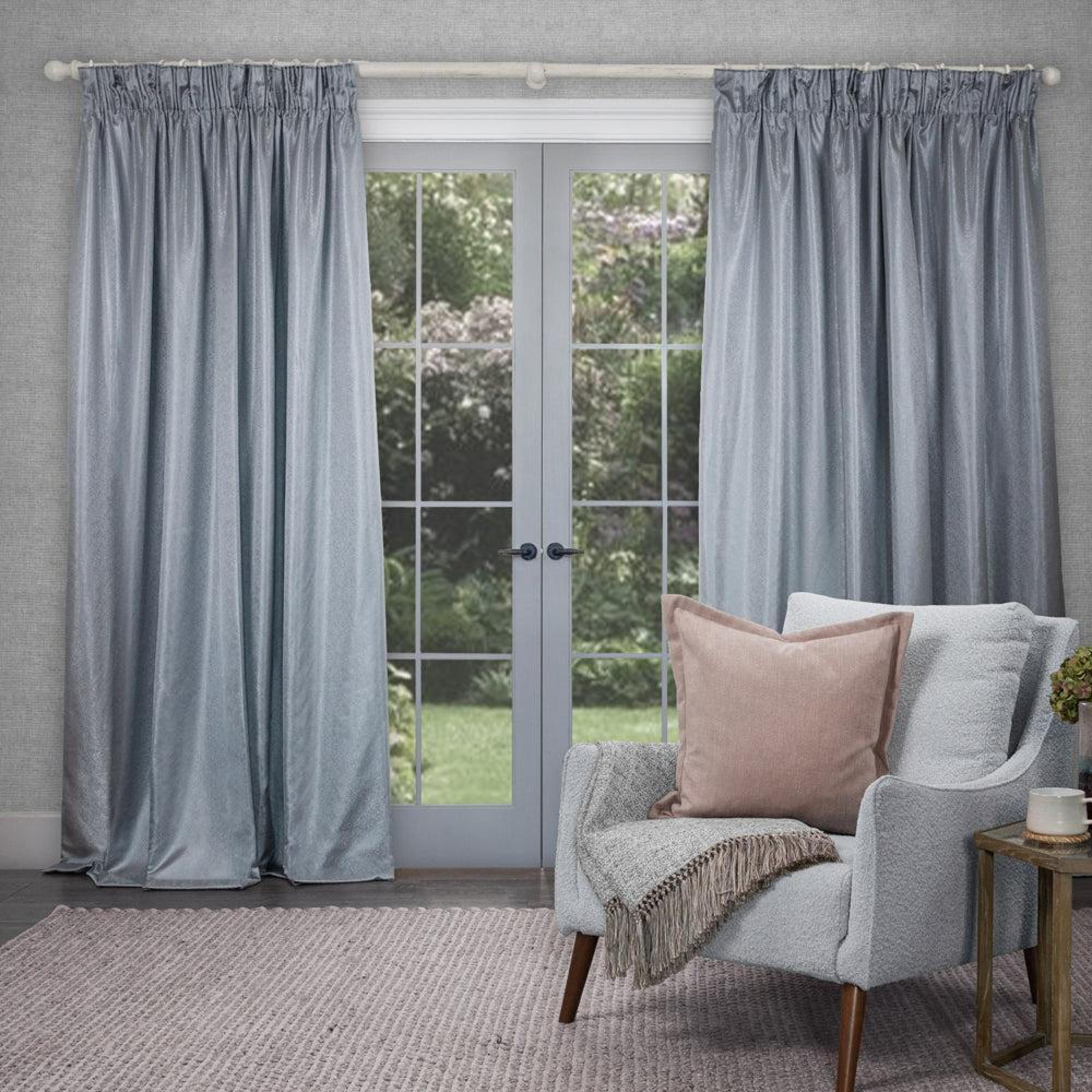 Product photograph of Voyage Maison Sereno Silver Woven Pencil Pleat Curtains from Choice Furniture Superstore.