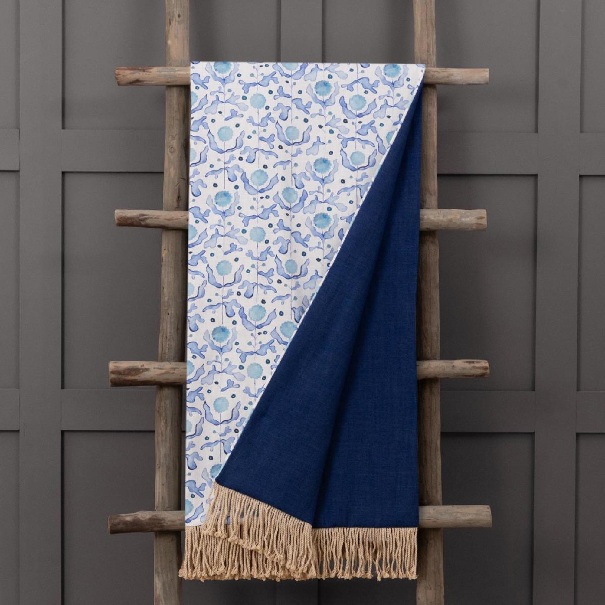 Product photograph of Voyage Maison Mariani Cobalt Printed Fringe Throw from Choice Furniture Superstore.