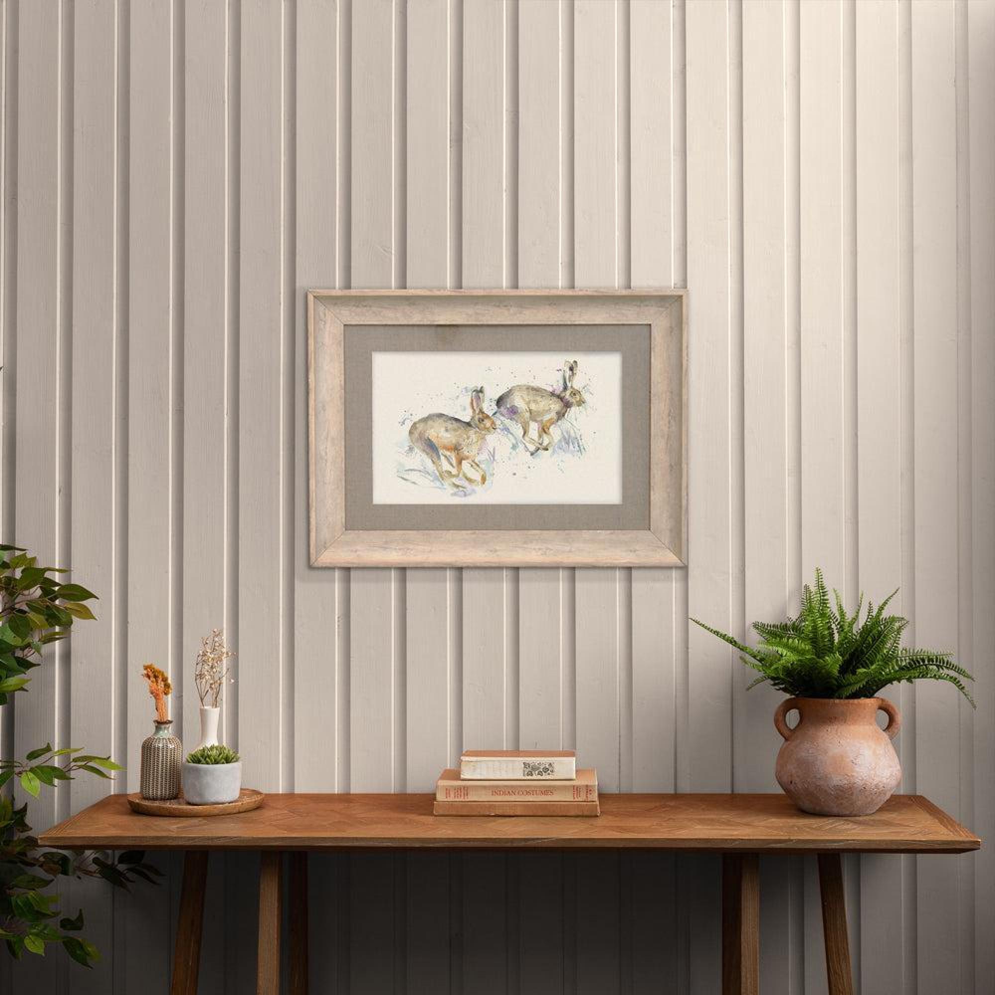 Product photograph of Voyage Maison Hurtling Hares Birch Framed Print from Choice Furniture Superstore.