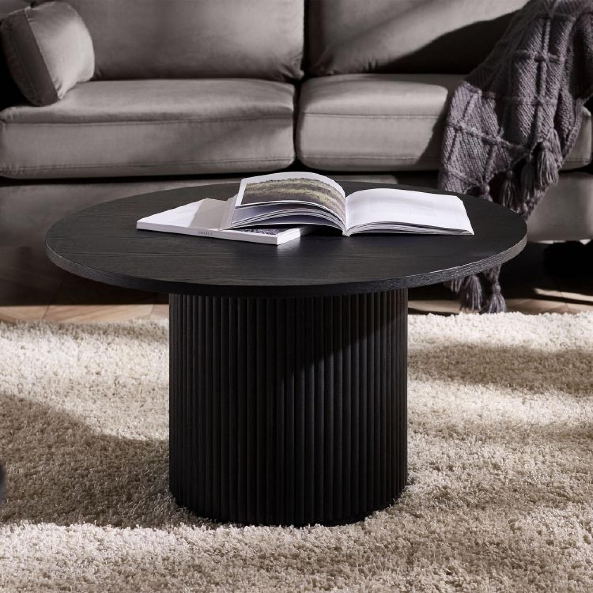 Product photograph of Louis Black Fluted Round Coffee Table from Choice Furniture Superstore.