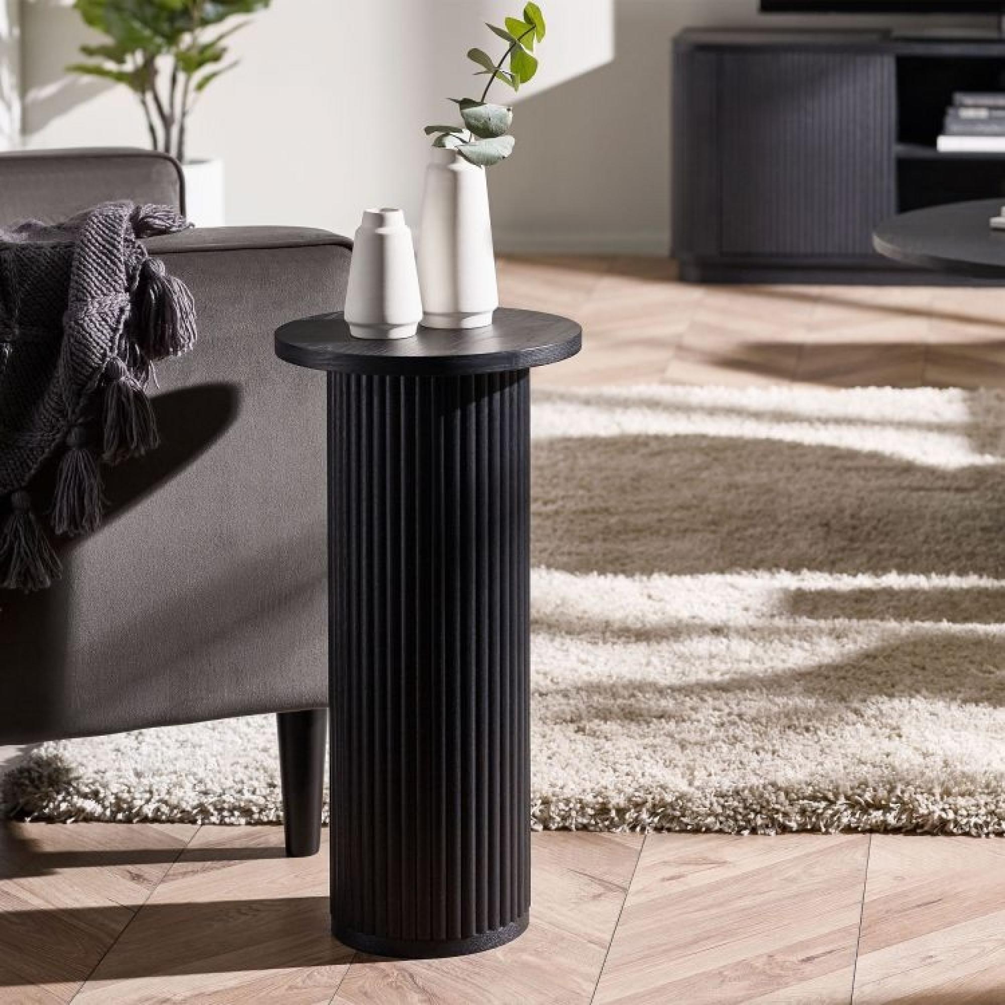 Product photograph of Louis Black Round Drinks Table - Fluted Base from Choice Furniture Superstore.