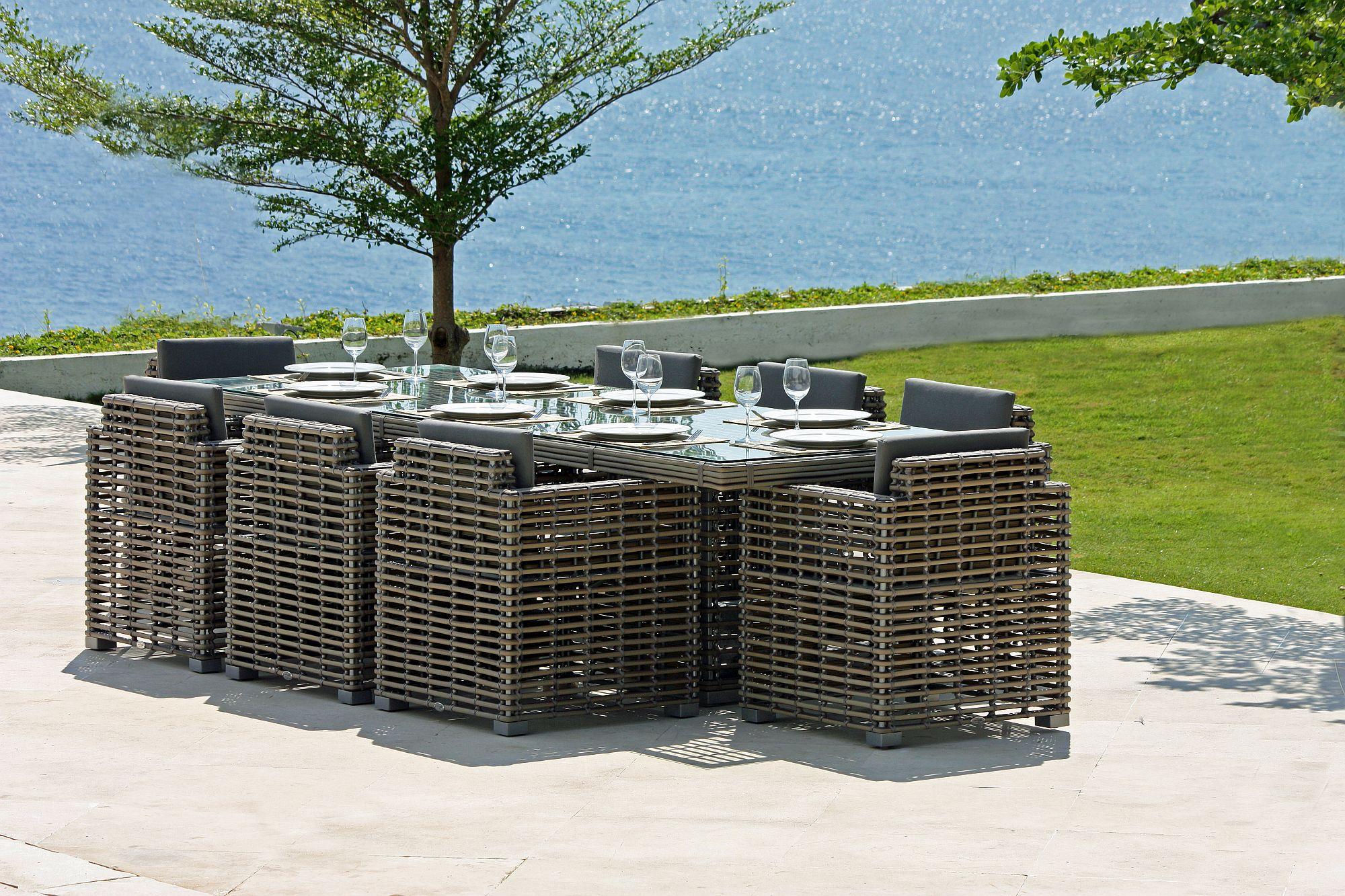 Product photograph of Skyline Castries Walnut Rattan And Glass Top Outdoor 12 Seater Dining Table - 280cm from Choice Furniture Superstore.